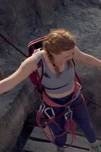A climber on a broken rope bridge high above a valley in the official trailer artwork for the Lionsgate film Fall 2 Deadpoint