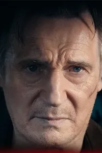 A man at the wheel of a car in the official trailer artwork for the action film The Mongoose